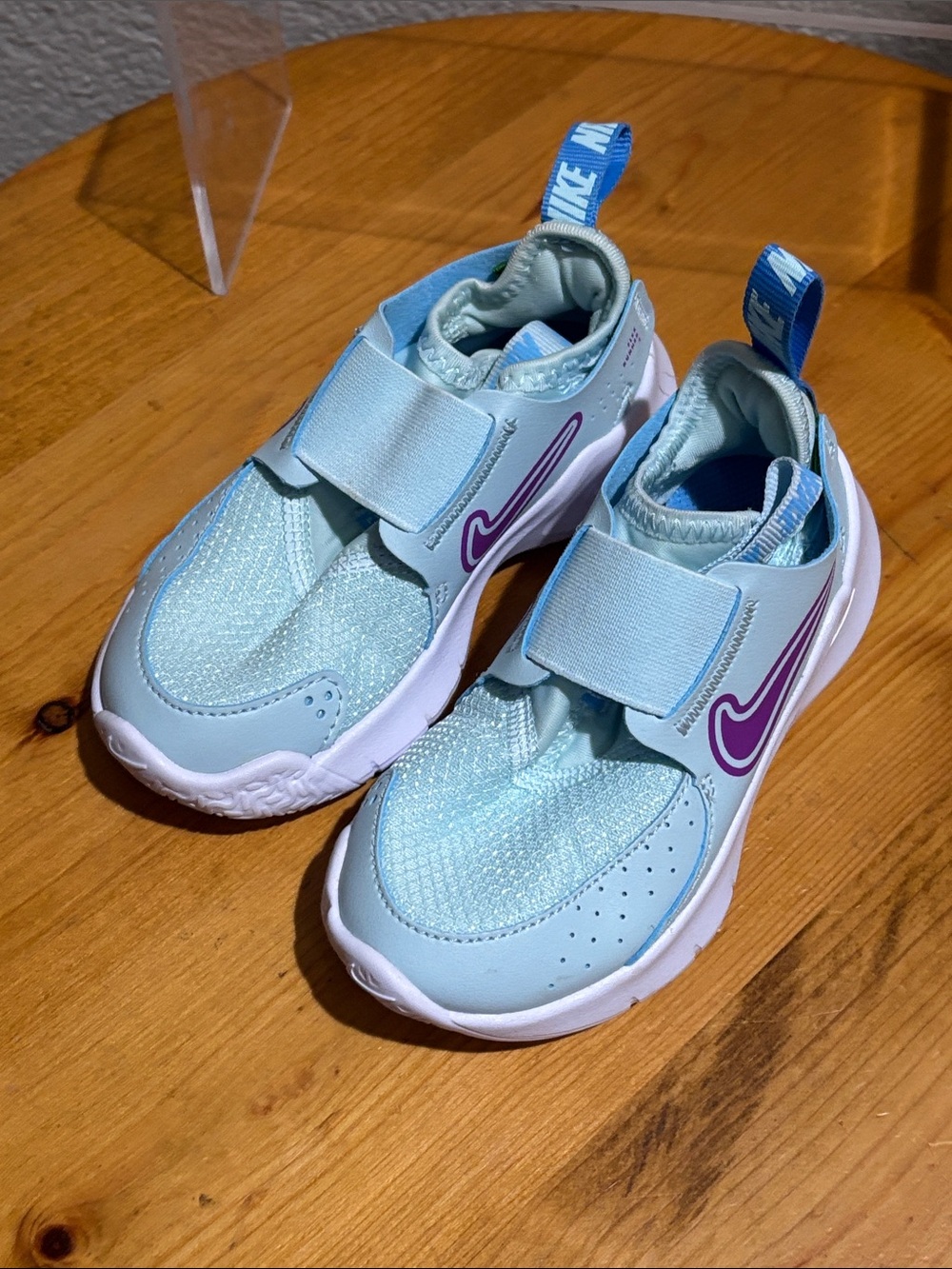 Nike Kids Light Blue Slip-On Sneakers with Purple Swoosh 8C